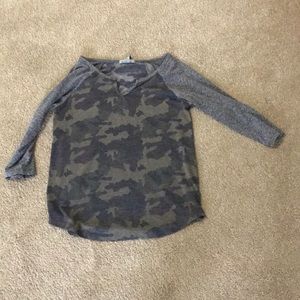 Camo and grey long sleeve shirt.